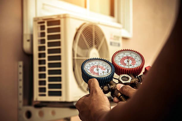 Professional Heat Pump Repair technician working in Whitewright, TX